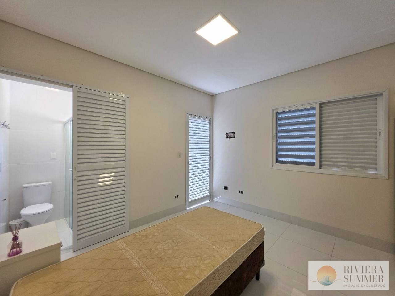 Casa com 5 dormitórios à venda, 420 m² por R$ 8.300.000,00 – Riviera Módulo 21 – Bertioga/SP