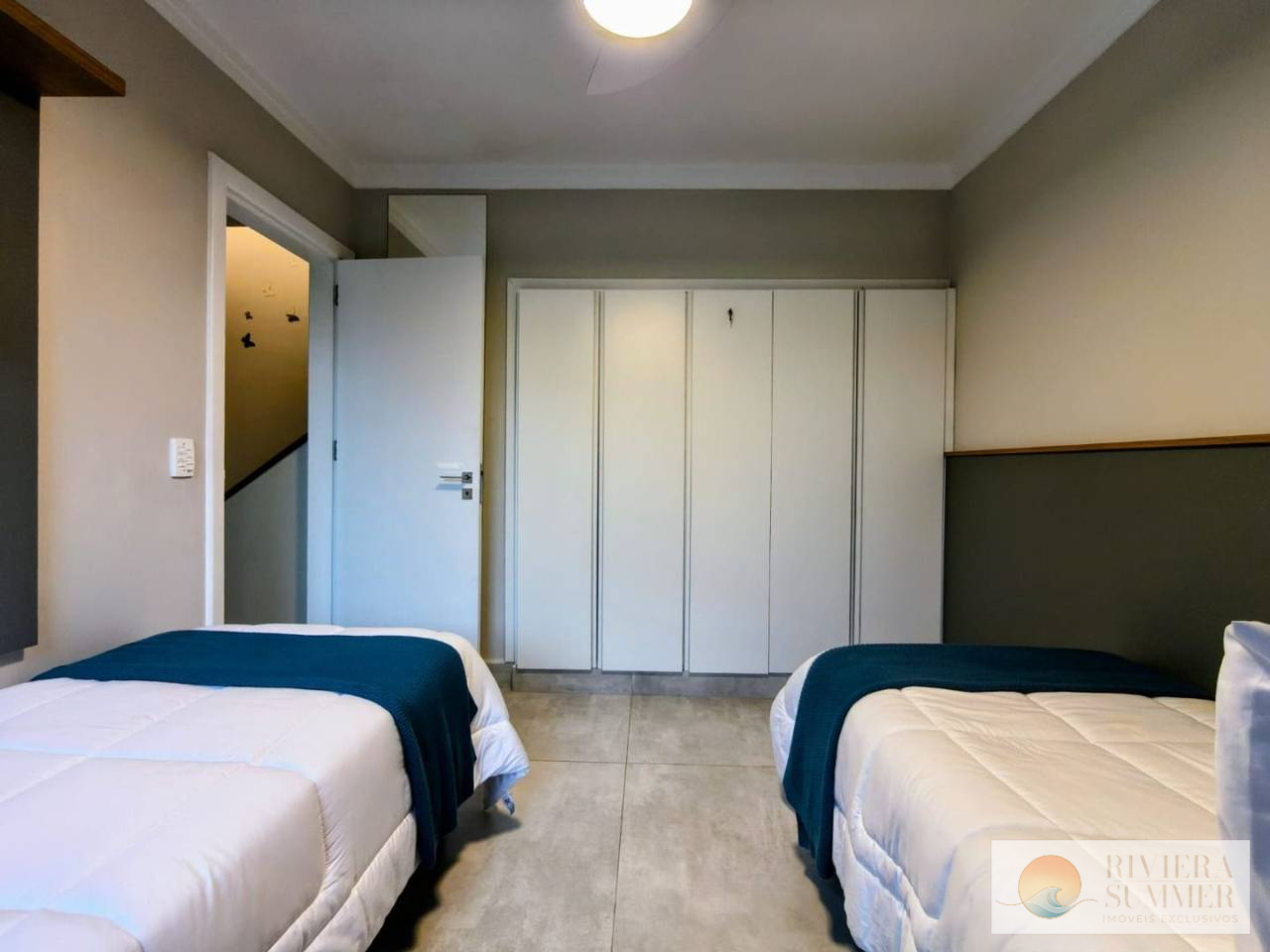 Village com 2 dormitórios à venda, 57 m² por R$ 1.000.000,00 – Riviera Módulo 26 – Bertioga/SP
